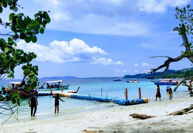 Family exploring the beach jetty, Andaman islands