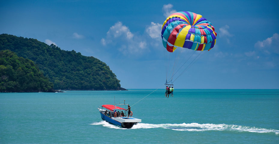 Person parasailing above the ocean