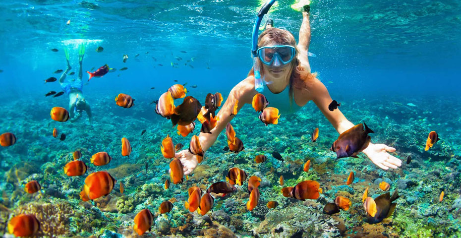 Boat on clear shallow water for snorkelling
